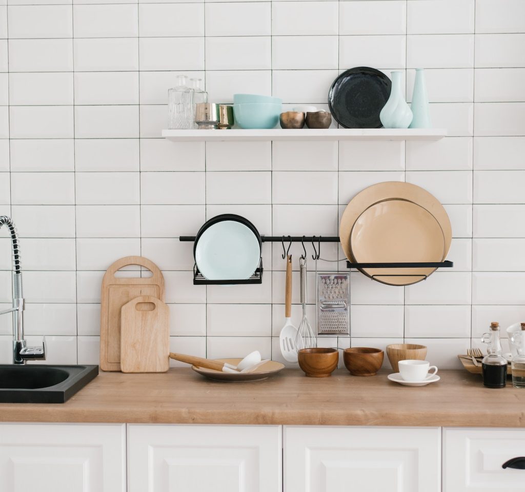 8 Brilliant Kitchen Tools That Cut Your Cooking Time in Half kitchen-utensils-and-utensils-in-the-bright-white-wooden-kitchen-1