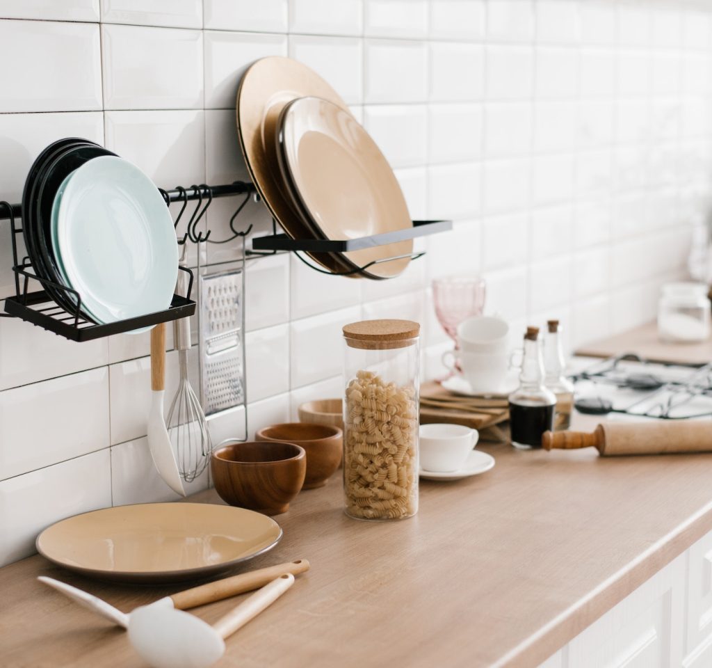 8 Brilliant Kitchen Tools That Cut Your Cooking Time in Half kitchen-utensils-are-on-the-cabinet-the-interior-of-the-room-in-the-scandinavian-style